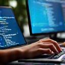 Software developer working on laptop